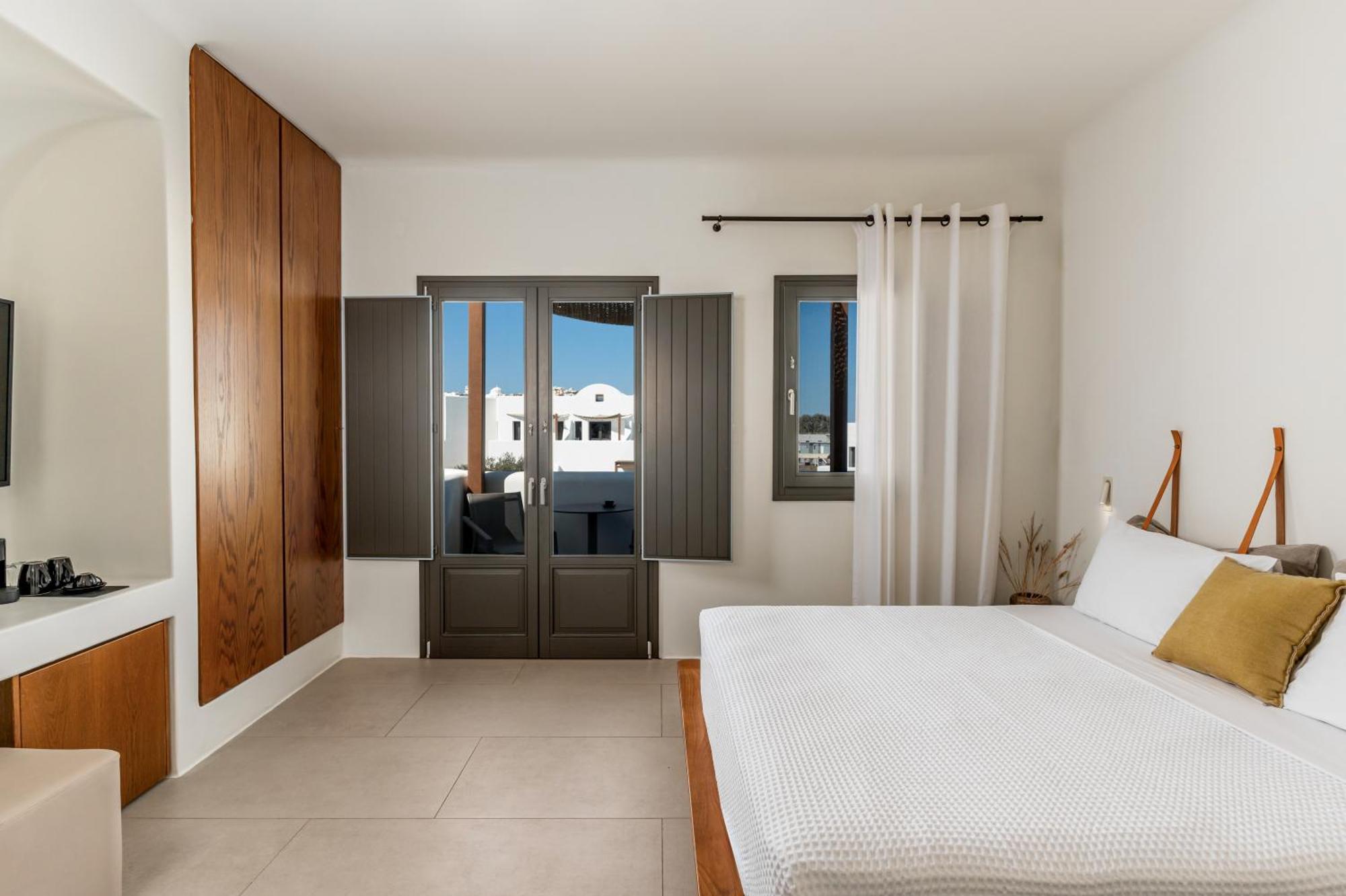 Orama Hotel&Spa Fira  Exteriér fotografie A bedroom at the hotel